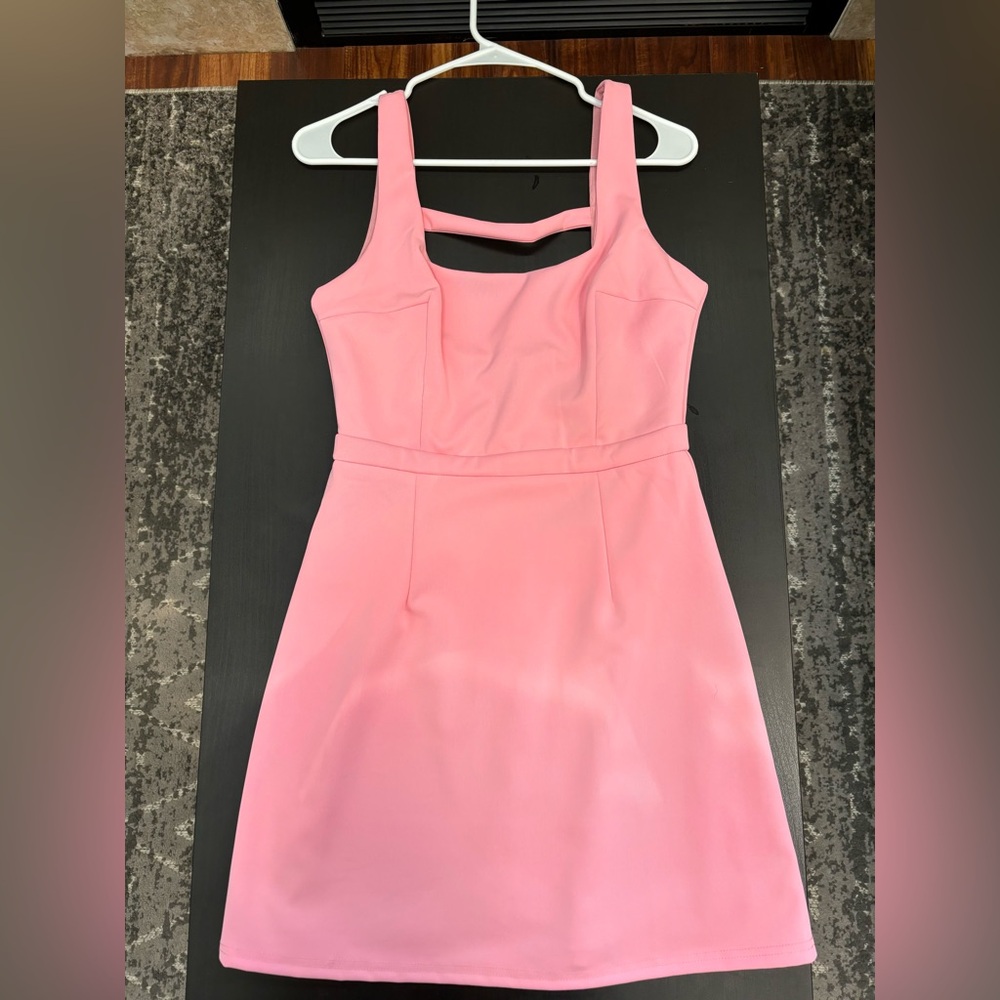 Women’s pink dress with cut out in back